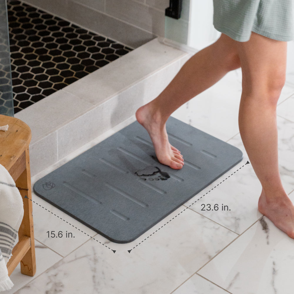 15.6" x 23.6" dimensions of rain bath stone mat from Dorai Home