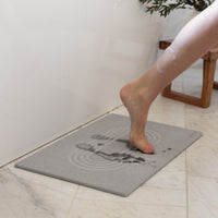 Original Current bath stone in Ash quickly absorbs water from wet feet in bathroom. 