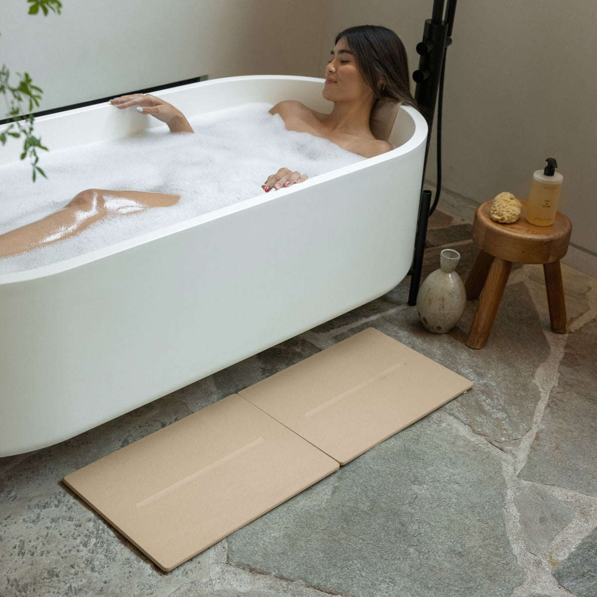 Clay Medium Bath Stone Mat spread into to sections in modern bathroom. 