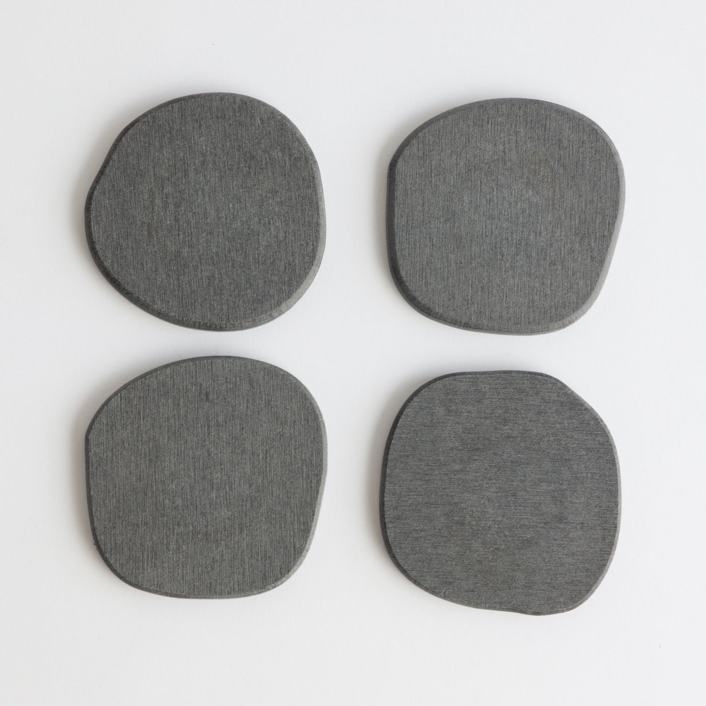 Modern Slate Stone Coaster set on white background.