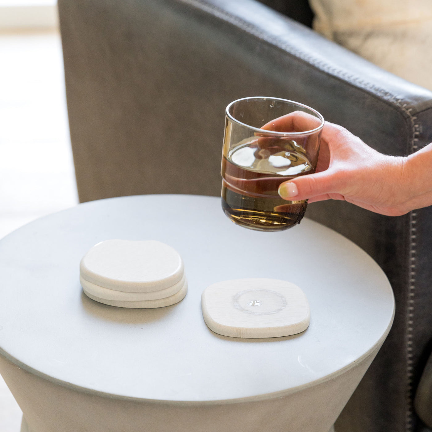 Sandstone Stone Coaster quickly dries water ring from sweating drinks.
