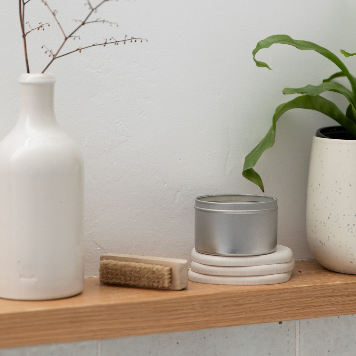 Modern Sandstone Stone Coaster in bathroom with candle.
