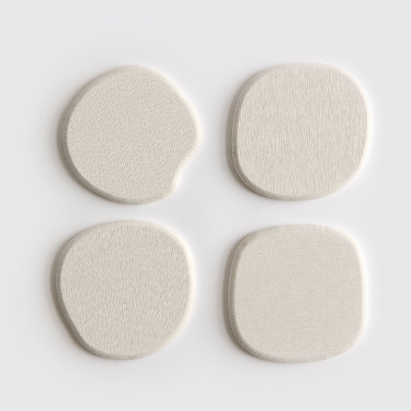Modern Sandstone Stone Coaster set on white background.