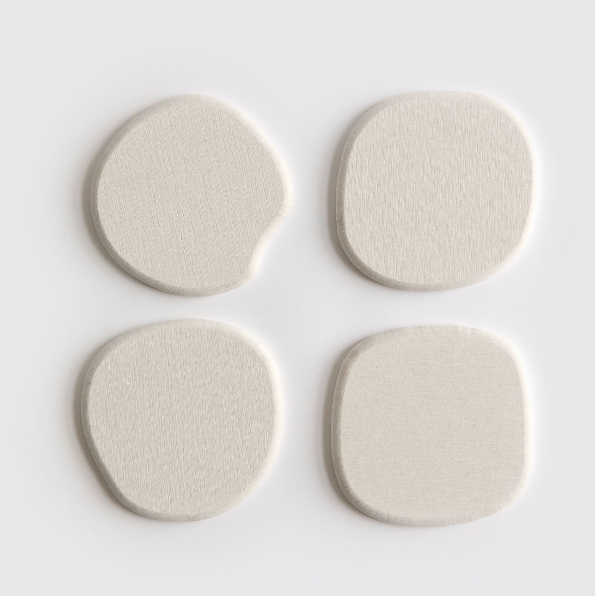 Modern Sandstone Stone Coaster set on white background.