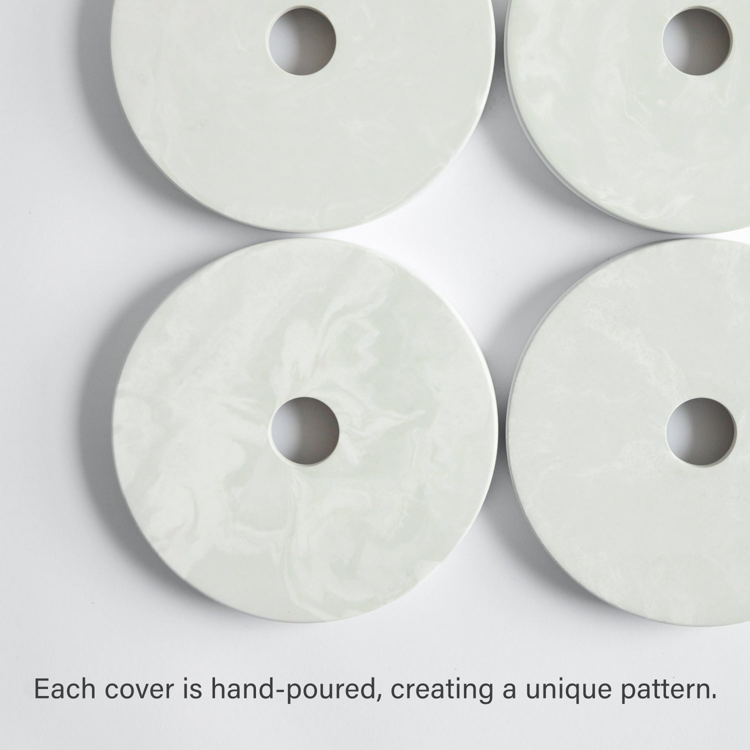 Four paper towel base - each hand, poured creating a unique pattern.