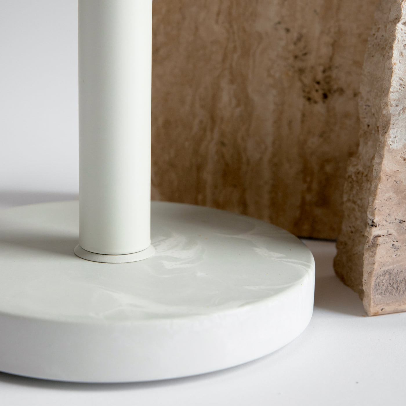 Paper towel holder quick-drying stone base with rock in background