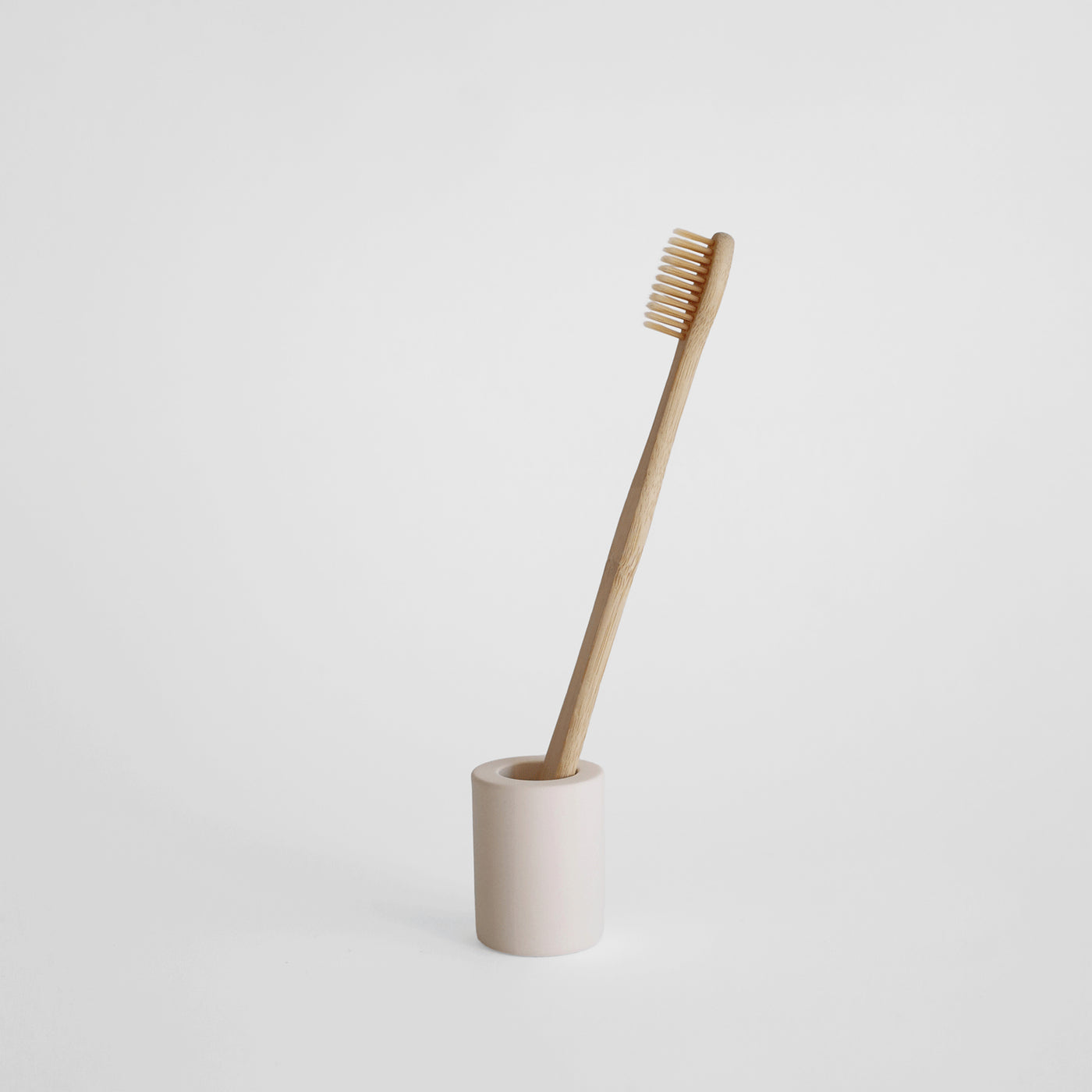 small toothbrush holder in beige, made from diatomaceous earth - Dorai Home