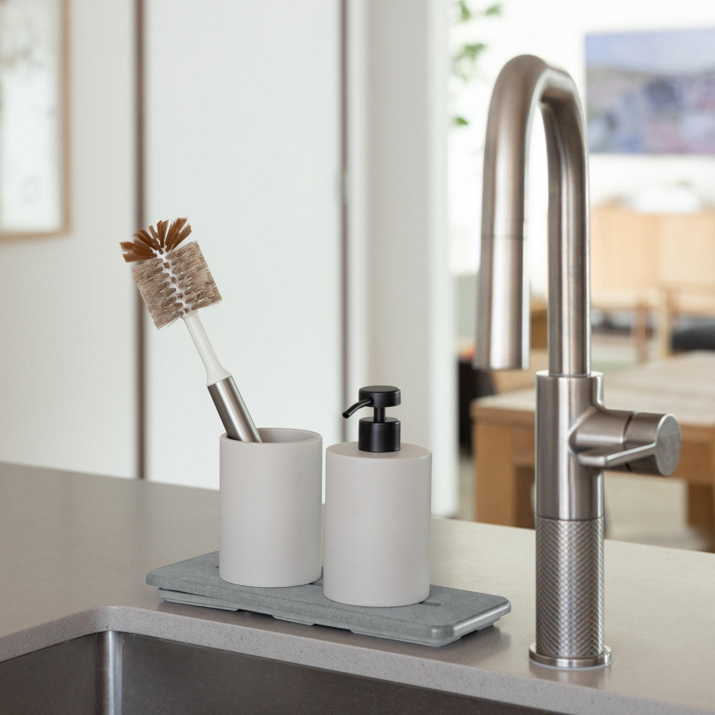 diatomaceous earth stone soap caddy set with soap dispenser and brush holder in kitchen - Dorai Home