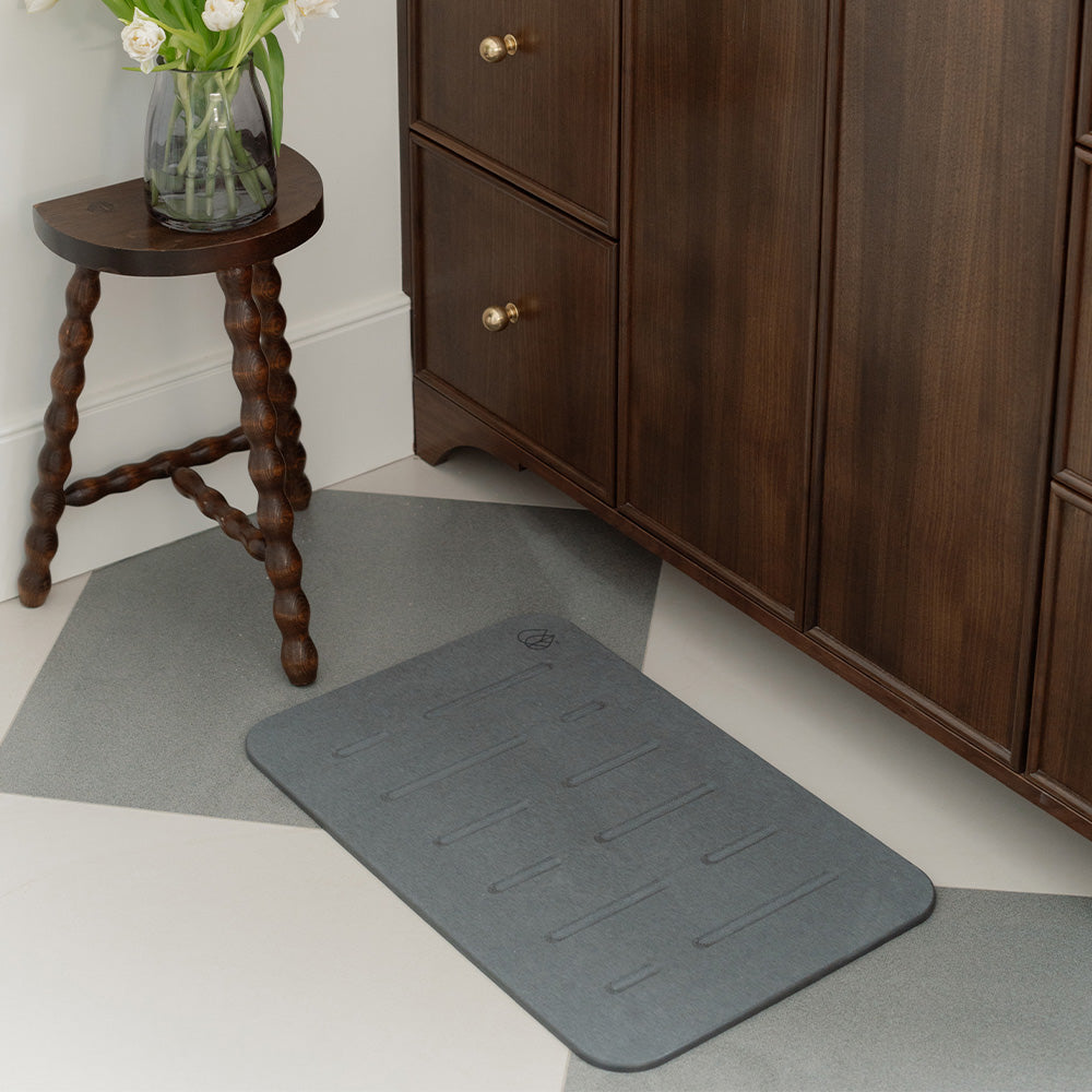 rain bath stone on bathroom floor