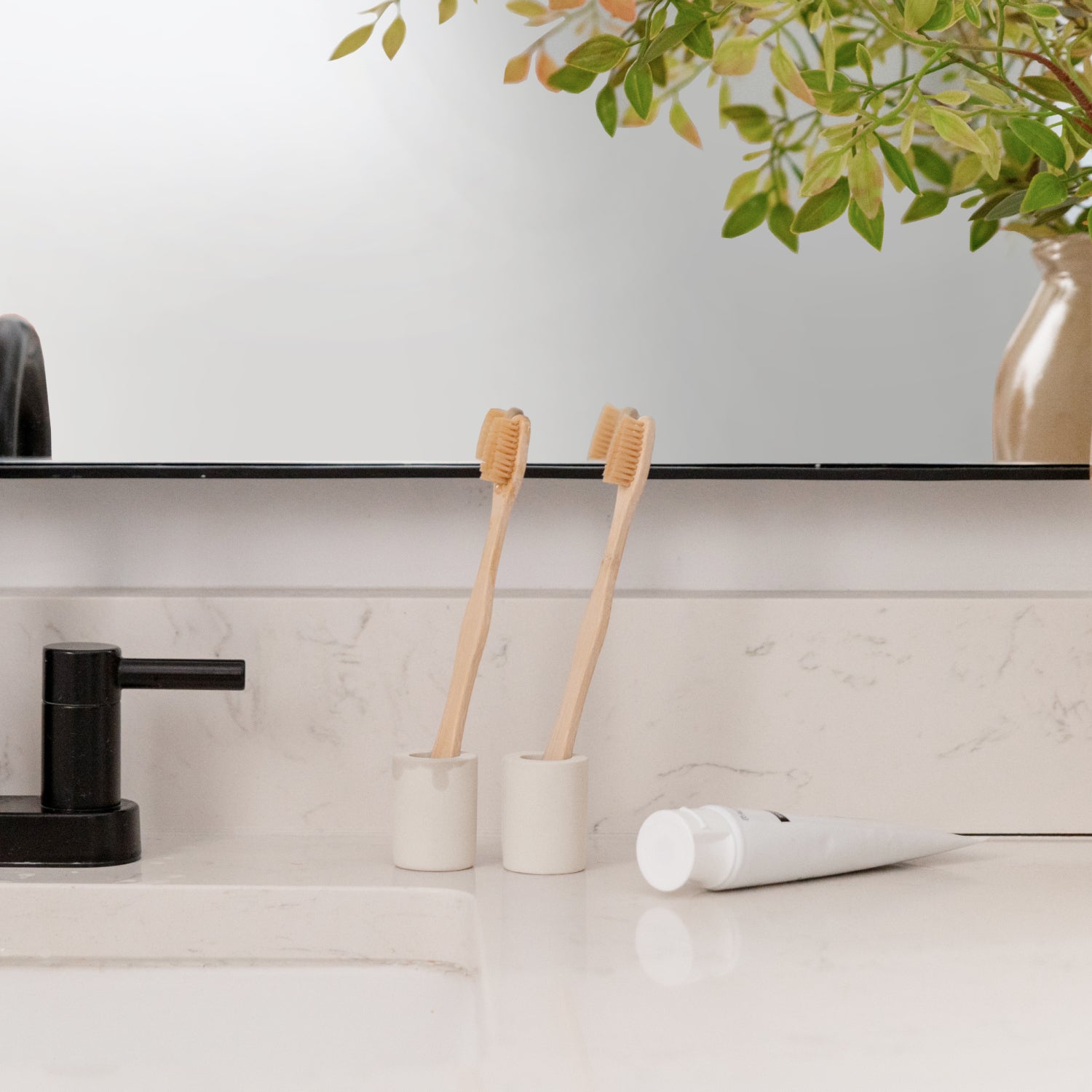 2-Pack of small toothbrush holders on bathroom counter - Dorai Home