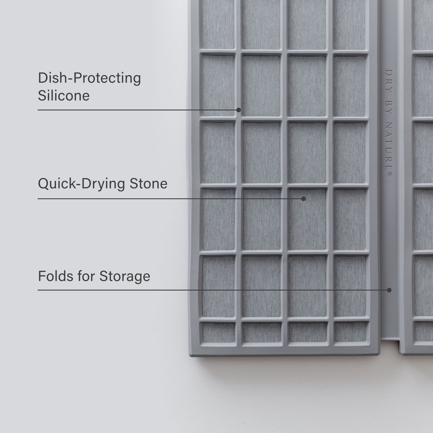 Gray dish-drying rack with labeled features on a light gray background