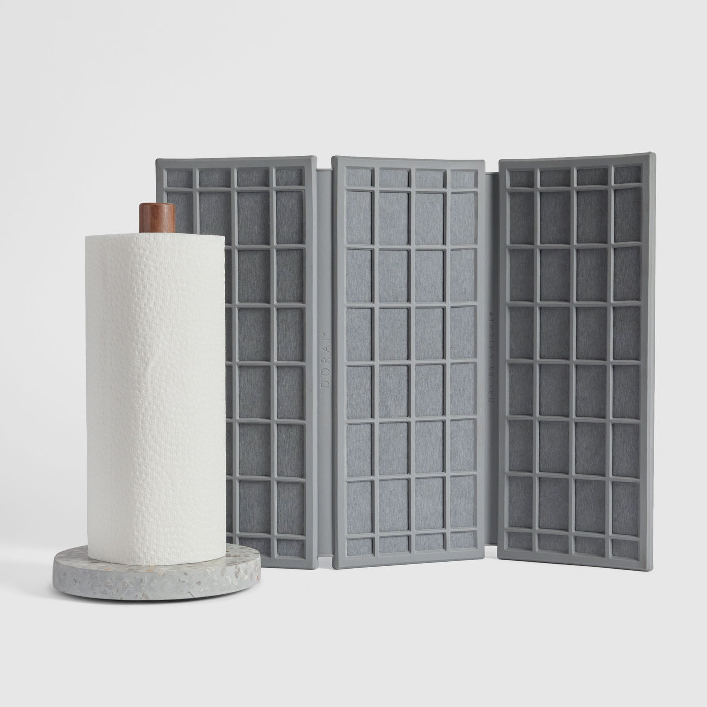 Basalt Paper Towel Holder and Slate Ridge Dish Pad on white background.