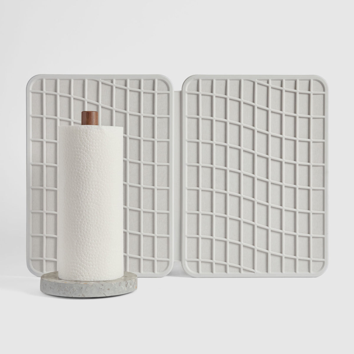 Basalt Paper Towel Holder and Glacier Large Drift Dish Pad on white background.