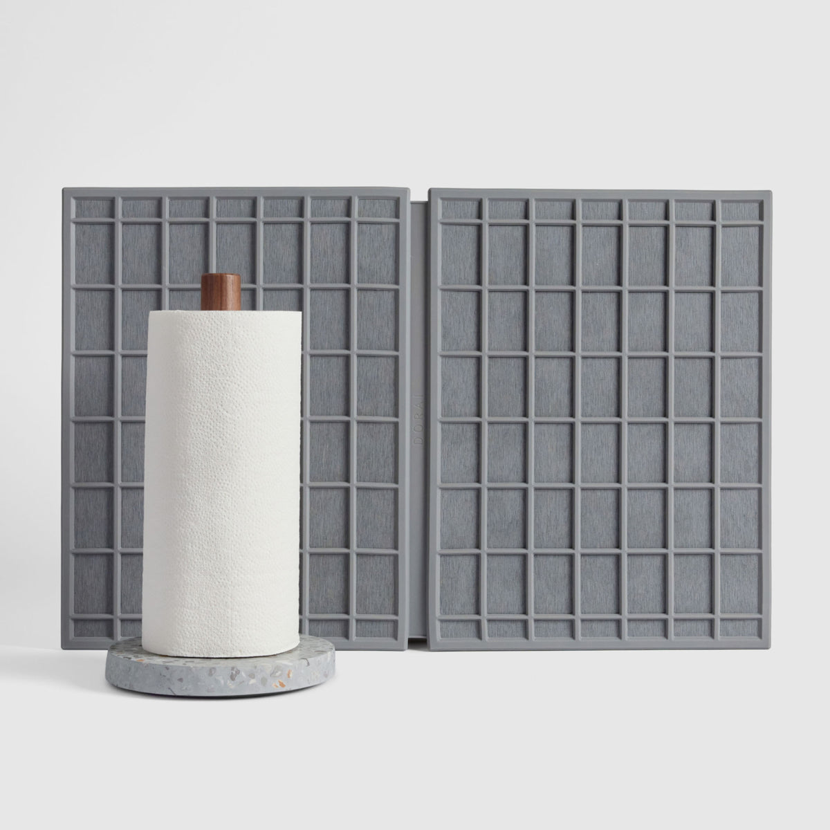 Basalt Paper Towel Holder and Slate Large Ridge Dish Pad on white background.