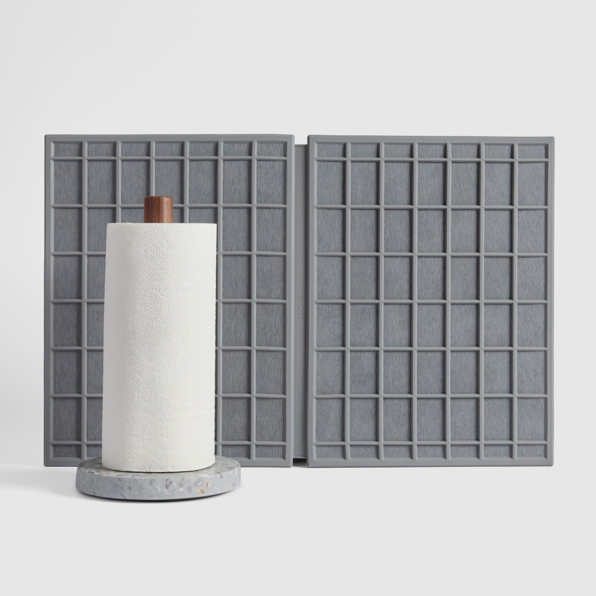 Basalt Paper Towel Holder and Slate Large Ridge Dish Pad on white background.