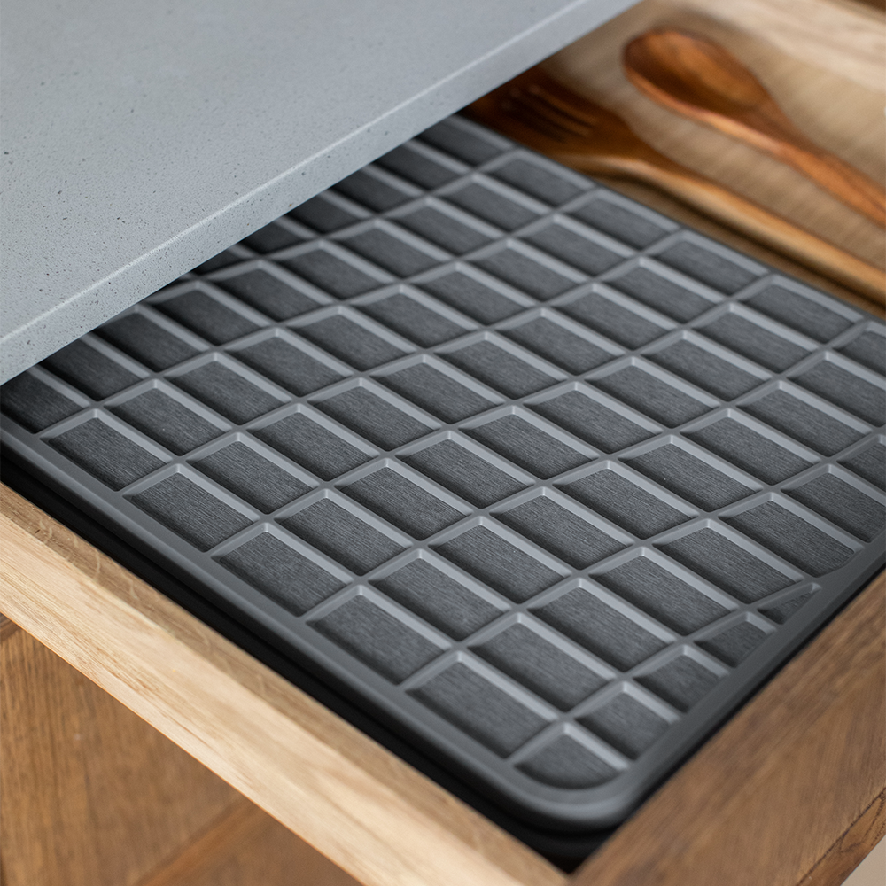 folded dish pad in drawer for easy storage 
