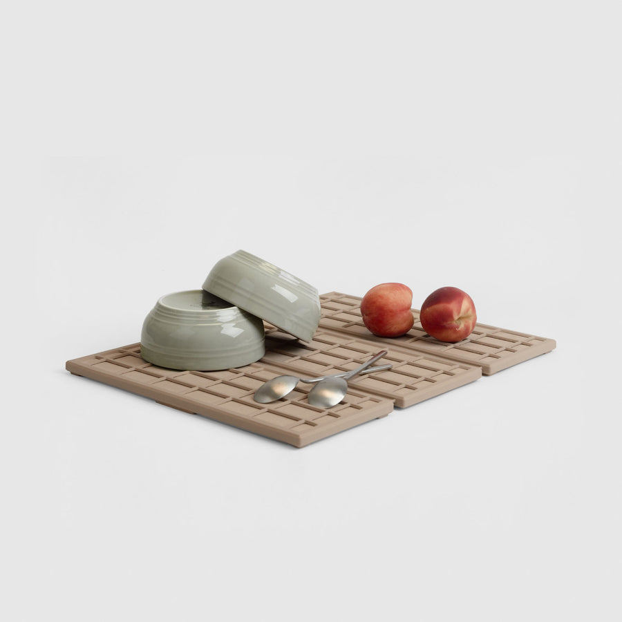 Clay Ridge Dish Pad on white background with dishes and produce. | Pre-Order Clay | Clay Collection Image