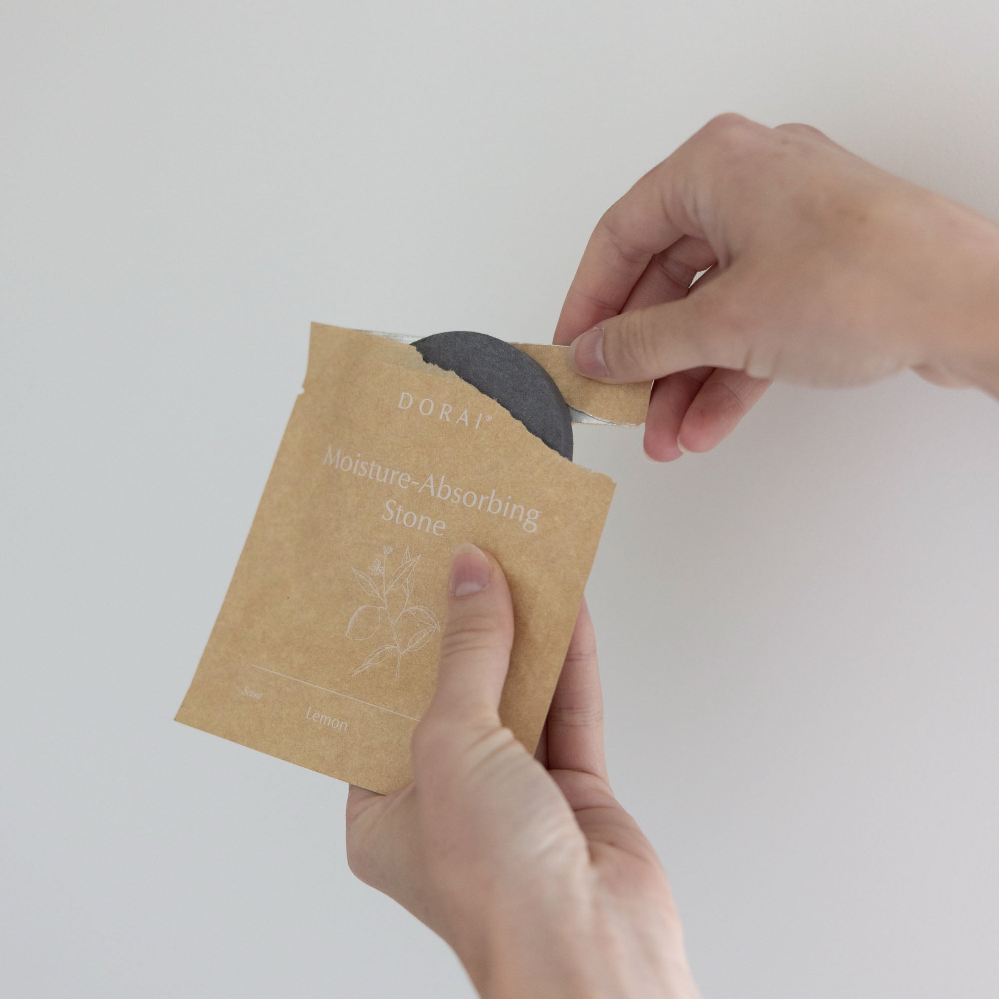 Moisture-absorbing stone with lemon essential oil. 