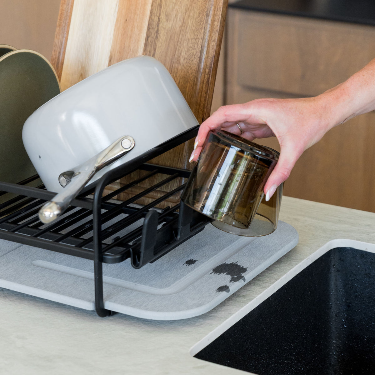 Basalt Dish Rack replacement stones in kitchen with loaded, wet dishes. 