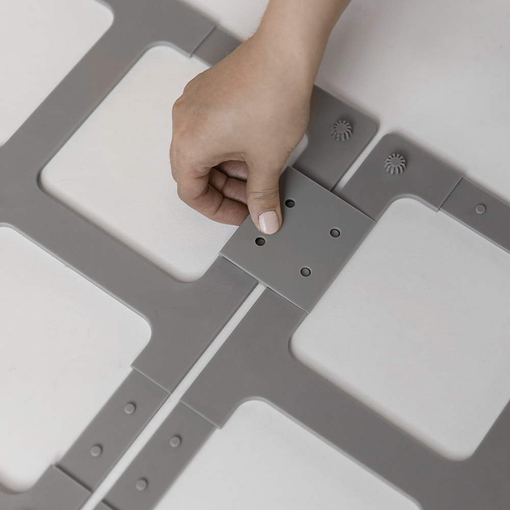 silicone base being assembled with plastic clips
