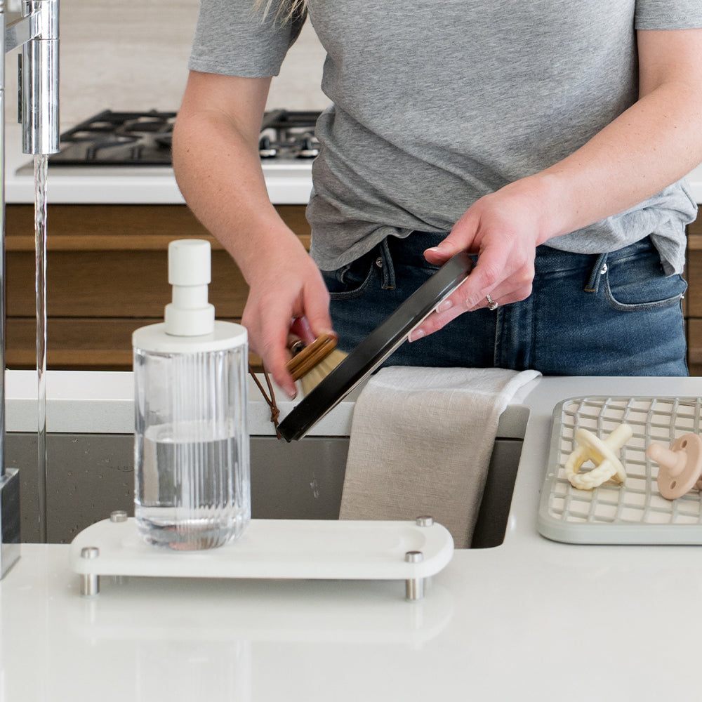 sink caddy and dish pad in kitchen - Dorai Home