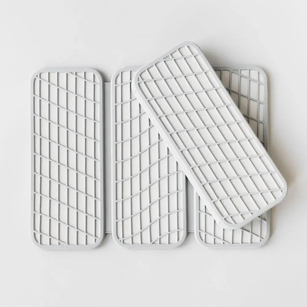 Two Dorai Dish Pads in sandstone