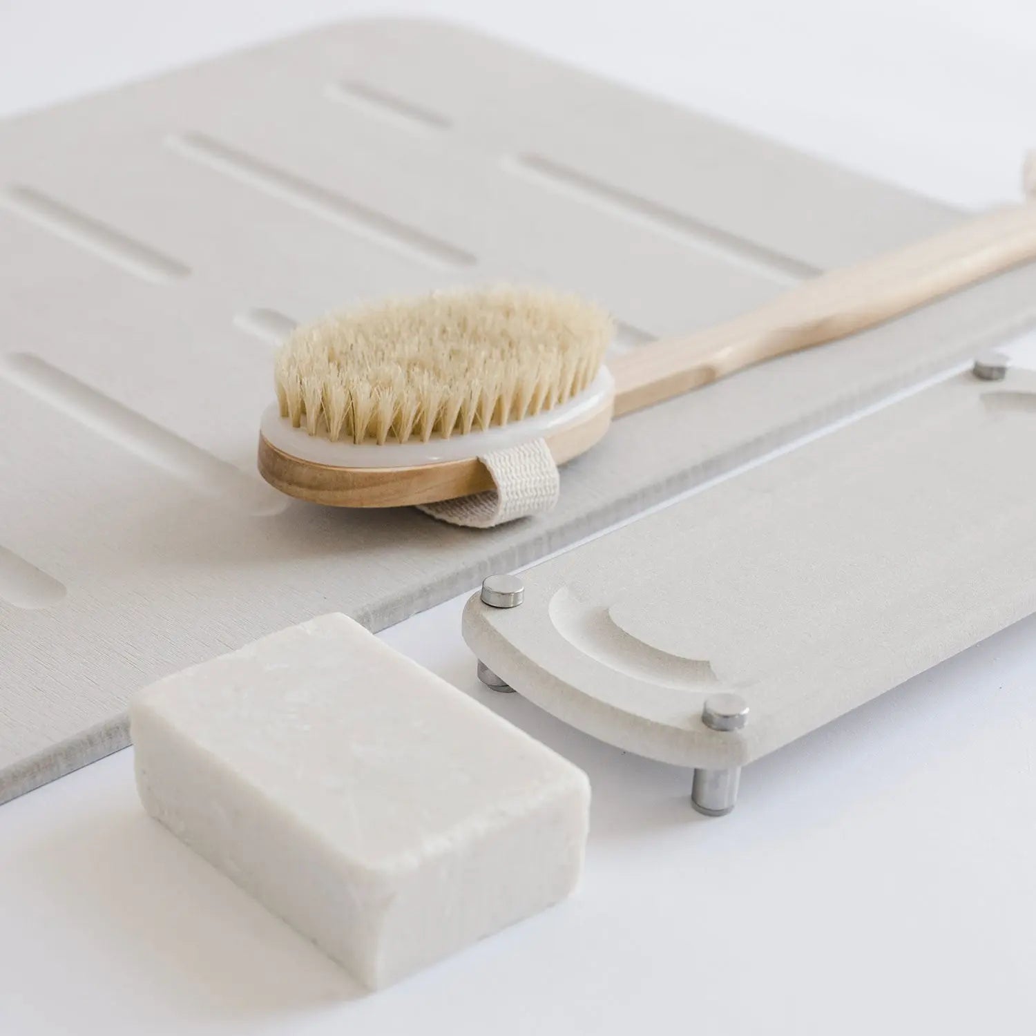 elevated sink organizer with metal legs and shower bath stone